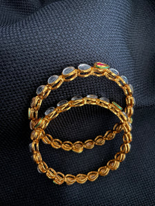 Gold Polish Kundan Bangles Set